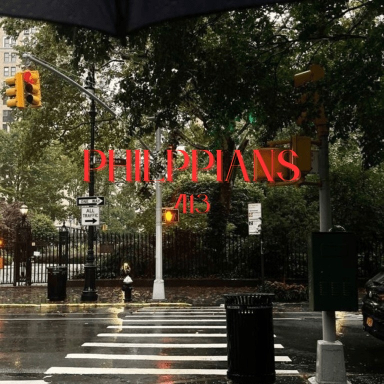 Rain-soaked city street showing a crosswalk with traffic lights and an umbrella overhead. Text reads "PHILIPPIANS 4:13," highlighting themes of strength and perseverance.